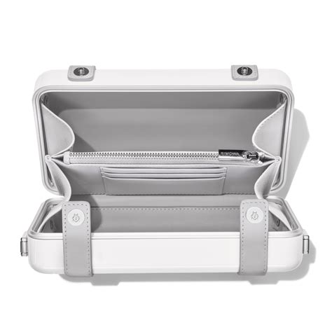 rimowa polycarbonate cross body bag.